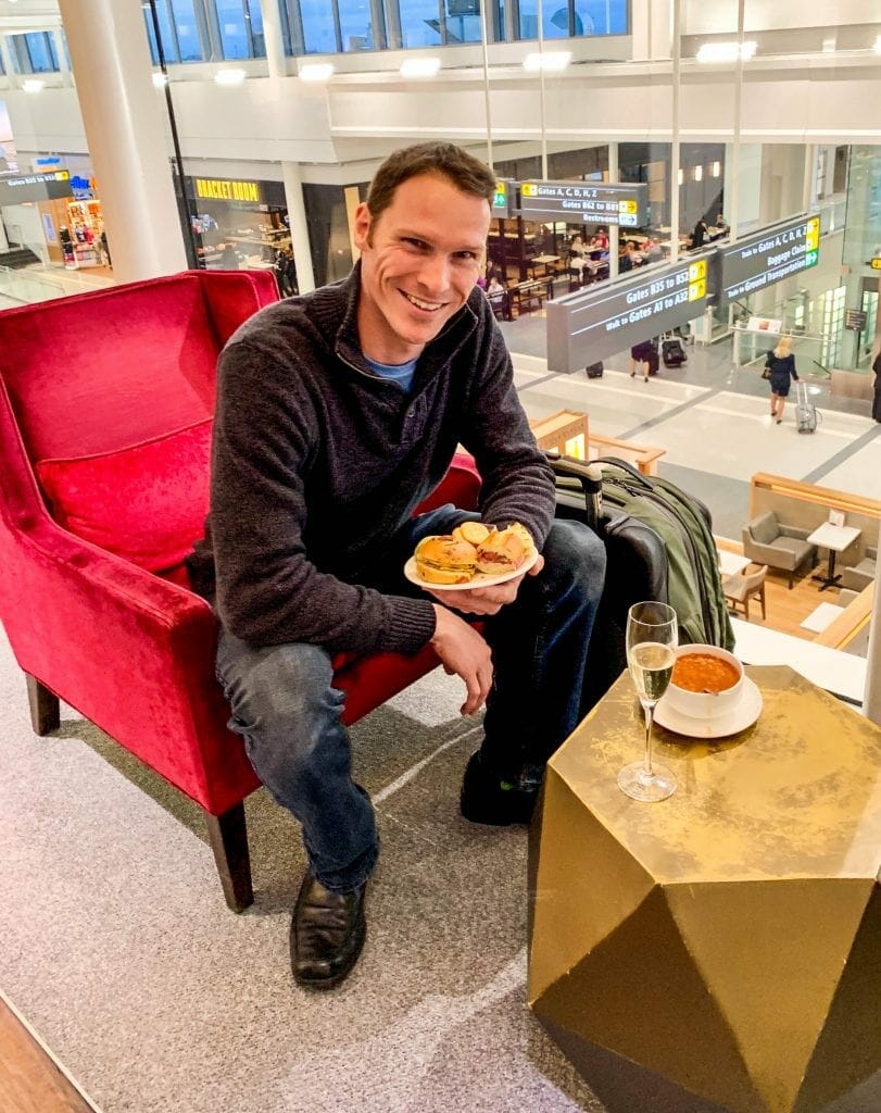 Enjoying champagne and dinner at a British Airways lounge. Our tips can guide you to have this experience. 